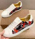 Gucci White Low-Top Sneakers with Black and Red Sides