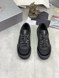 Prada Paneled Low-Top Sneakers